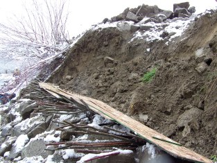 Installation of vegetated riprap on eroded bank