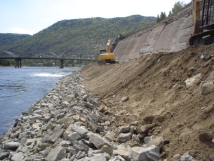 First lift of riprap placed, gravel filter placed on bank