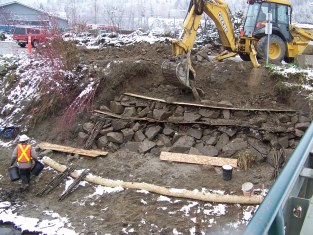 Installation of vegetated riprap on eroded bank