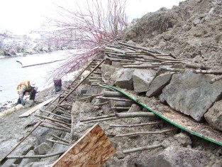 Installation of vegetated riprap on eroded bank