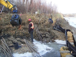 Spyder hoe using wooden stinger for live stakes insertion, November 2008 